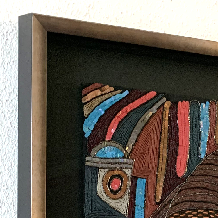 Detail van de kraaltjes en het lijstprofiel